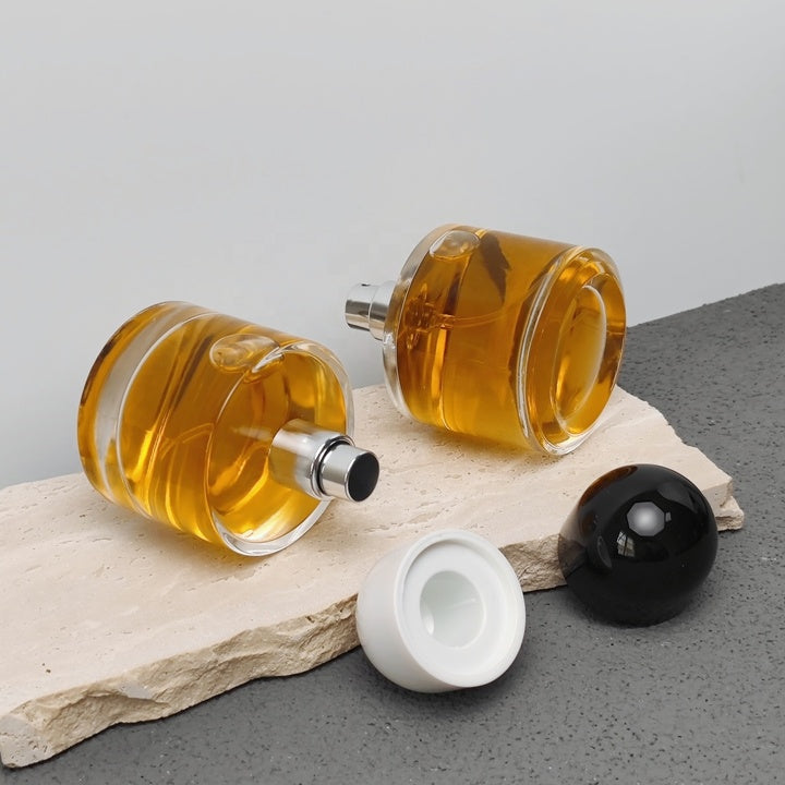 50ml Round Glass Perfume Bottle Crimp Neck Luxury Fragrance Packaging with Custom Cap OEM ODM Perfume Bottle Manufacturer