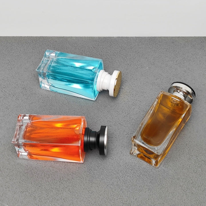 100ml Luxury Glass Perfume Bottle Empty Fragrance Packaging Bottle with Decorative Cap Custom Logo OEM ODM Perfume Packaging