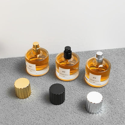 Recyclable 40ml Short Cylinder Glass Perfume Bottle with Ribbed Gold/Silver/Black Cap Empty and Sealed with Pump Sprayer