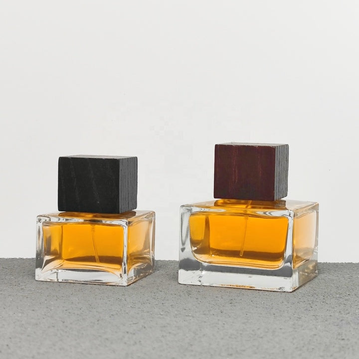 Luxury Square Glass Crimp Neck 50ml 100ml Empty Perfume Bottles with Pump Sprayer Screen Printing Wood and Plastic