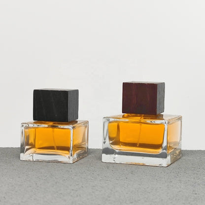 Luxury Square Glass Crimp Neck 50ml 100ml Empty Perfume Bottles with Pump Sprayer Screen Printing Wood and Plastic