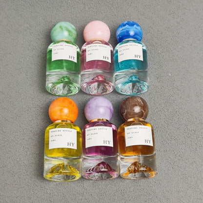 Wholesale Artistic Marble Pattern Oval Glass Perfume Bottle 30ml 50ml 100ml Mountain Bottom Design with Pump Sprayer Ball Cap