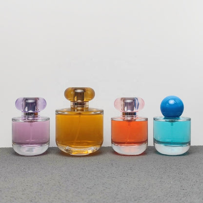 50ml & 100ml Cylinder Glass Perfume Bottles with Pump Sprayer and Stylish Caps for Home Boutique & Display