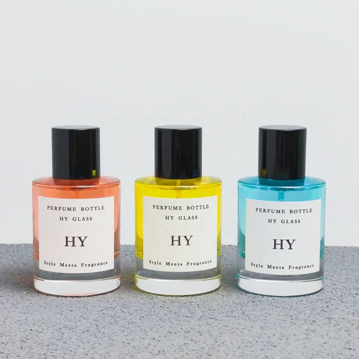 High Quality 50ml Minimalist Empty Glass Perfume Spray Bottle Crimp Neck and Black Cap with Pump Sealer