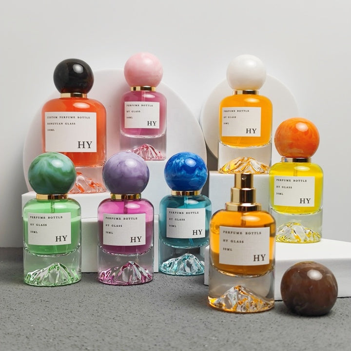 Wholesale Artistic Marble Pattern Oval Glass Perfume Bottle 30ml 50ml 100ml Mountain Bottom Design with Pump Sprayer Ball Cap