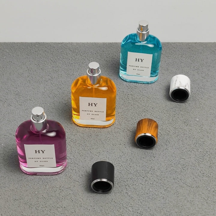 Premium 50ml Flat Easy Crimp Perfume Bottle with Luxury Round Wood Marble Textured Cap Pump Sprayer Seal Cute Design