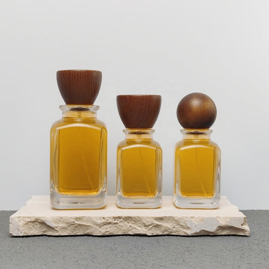 Luxury Unique Square Design 50ml 100ml Arabic Perfume Bottles with Crimp Atomizer and Wood Cap Screen Printing
