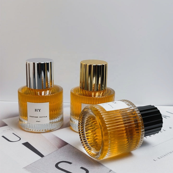 Recyclable 40ml Short Cylinder Glass Perfume Bottle with Ribbed Gold/Silver/Black Cap Empty and Sealed with Pump Sprayer