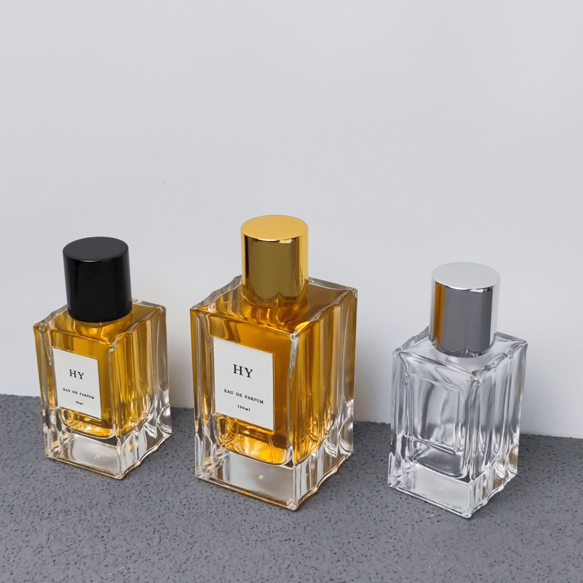 50ml 100ml Clear Glass Square Bottle Wavy Sides for Perfume Screen Printed Black Gold Silver Ribbed Cylinder Cap Pump Sprayer