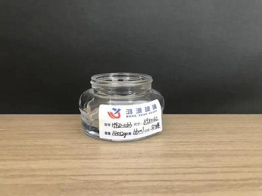 round glass cosmetic jar
