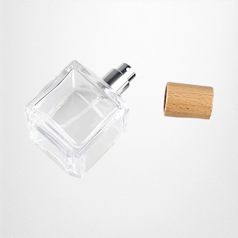 a cube perfume bottle is lying down