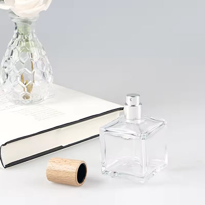 an empty cube perfume bottle