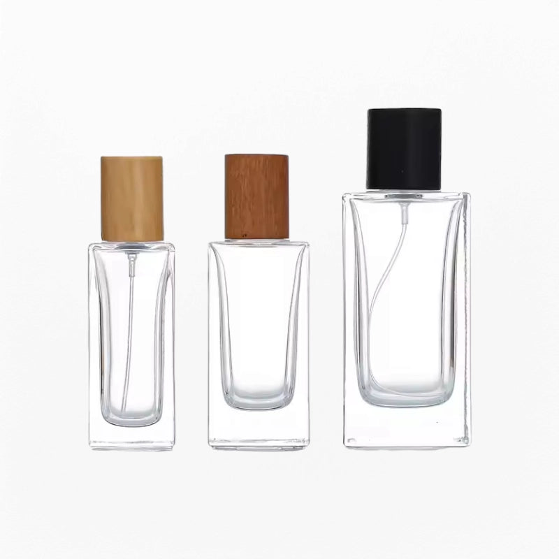 Three Empty Cologne Bottles Clear Glass