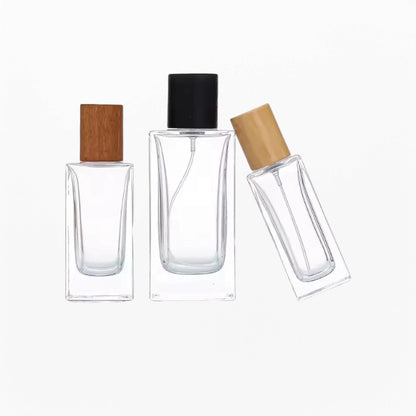 Three square glass perfume bottles with different volumes