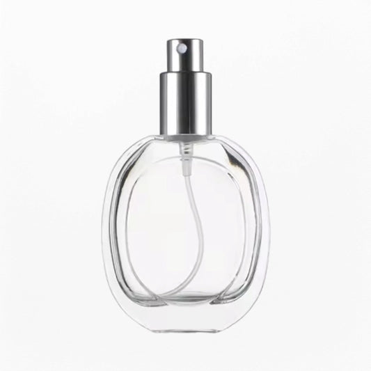 empty glass perfume bottle with silver pump sprayer