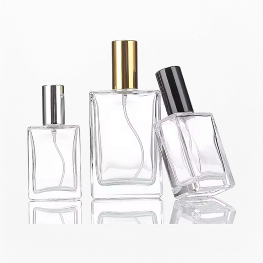 Three different volume empty perfume bottle