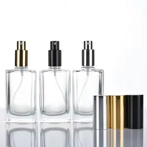 Fragrance Bottles With different colors of pump sprayers and Lids