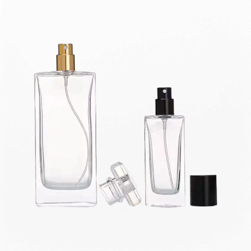 Two Fragrance Perfume Bottles with Different Caps