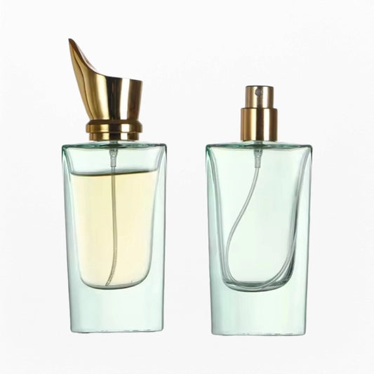 light green perfume bottles with golden sprayer and cap