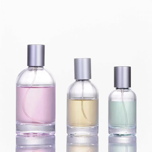 Cylindrical perfume bottles in 3 sizes