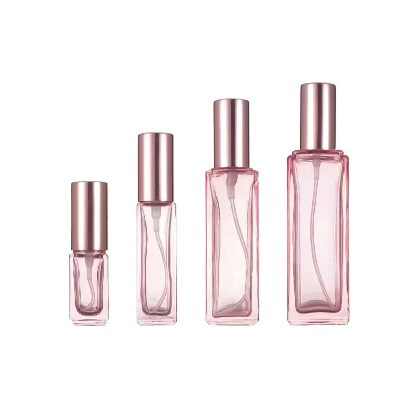 pink perfume bottles with 4 different volumes