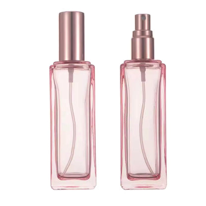 pink perfume bottles with pump sprayer