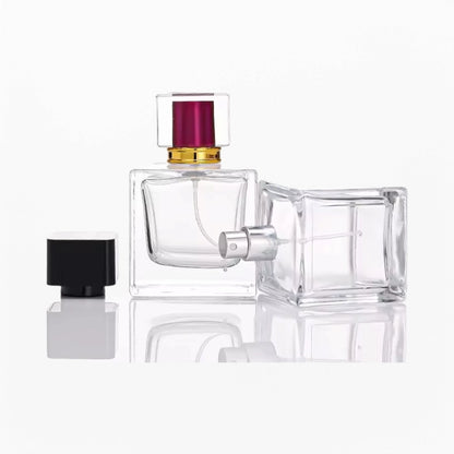 square glass perfume bottle with transparent and black caps