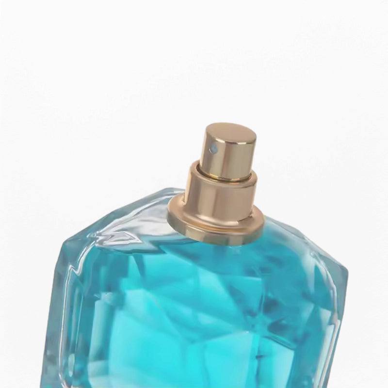 unique cube perfume bottle shoulder resembles a diamond cut with golden sprayer